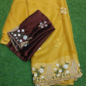 mustard yellow saree with contrasting maroon blouse